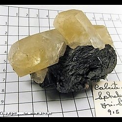 Mineral Specimen: Calcite, Heaxagonal Crystals (some bruising on one termination) on Sphalerite from Tri State District, Joplin, Missouri Mineral Specimen: Calcite, Heaxagonal Crystals (some bruising on one termination) on Sphalerite from Tri State District, Joplin, Missouri
