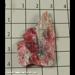 Mineral Specimen: Cummingtonite on Rhodonite from Morro da Mina, Conselheiro Lafaiete, Minas Gerais, Brazil Mineral Specimen: Cummingtonite on Rhodonite from Morro da Mina, Conselheiro Lafaiete, Minas Gerais, Brazil