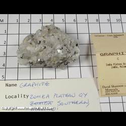 Mineral Specimen: Graphite Crystals in Marble from Zomba Plateau Quarry, Malawi Mineral Specimen: Graphite Crystals in Marble from Zomba Plateau Quarry, Malawi