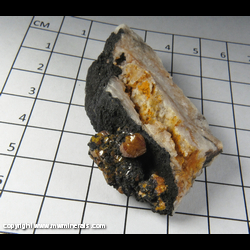 Mineral Specimen: Mimetite variety Campylite and Coronadite on Quartz from Dry Gill Mine, Caldbeck Fells, Cumbria, England