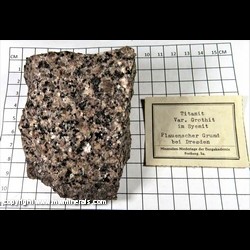 Mineral Specimen: Titanite variety: Grothite (first described location) in Syenite from Monzonite quarries, Plauenscher Grund, Dresden, Saxony, Germany Mineral Specimen: Titanite variety: Grothite (first described location) in Syenite from Monzonite quarries, Plauenscher Grund, Dresden, Saxony, Germany