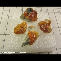 Mineral Specimen: Spessartine Garnet on Smoky Quartz from Tongbei, Fujian, China Mineral Specimen: Spessartine Garnet on Smoky Quartz from Tongbei, Fujian, China