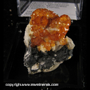 Mineral Specimen: Spessartine Garnet, Manganese Oxides, Microcline from Tongbei, Fujian, China Mineral Specimen: Spessartine Garnet, Manganese Oxides, Microcline from Tongbei, Fujian, China