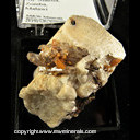 Mineral Specimen: Zircon (orange) and Quartz on Microcline from Mt. Malosa Massif, Zomba, Malawi Mineral Specimen: Zircon (orange) and Quartz on Microcline from Mt. Malosa Massif, Zomba, Malawi