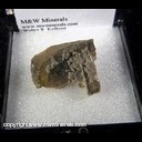 Mineral Specimen: Calcite on Siderite from Poudrette quarry, Mont Saint-Hilaire, Quebec, Canada, Ex. Norm Woods