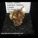 Mineral Specimen: Grossular Garnet variety: Hessonite (gemmy) from Jeffrey Quarry, Asbestos, Quebec, Canada, Ex. Norm Woods