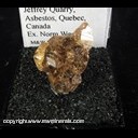 Mineral Specimen: Grossular Garnet variety: Hessonite (gemmy) from Jeffrey Quarry, Asbestos, Quebec, Canada, Ex. Norm Woods Mineral Specimen: Grossular Garnet variety: Hessonite (gemmy) from Jeffrey Quarry, Asbestos, Quebec, Canada, Ex. Norm Woods