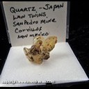 Mineral Specimen: Quartz, Japan Law Twin with Double Terminated Calcite from San Pedro Mine, New Placers Dist., Santa Fe Co., New Mexico, Ex. Norm Woods Mineral Specimen: Quartz, Japan Law Twin with Double Terminated Calcite from San Pedro Mine, New Placers Dist., Santa Fe Co., New Mexico, Ex. Norm Woods