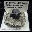 Mineral Specimen: Sphalerite etched from Calcite/Dolomite breccia from Arnold, Jefferson Co., Missouri, Ex. Norm Woods Mineral Specimen: Sphalerite etched from Calcite/Dolomite breccia from Arnold, Jefferson Co., Missouri, Ex. Norm Woods