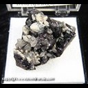 Mineral Specimen: Hematite variety: Specular, Calcite, Quartz from Great Western Orebody, Three Peaks, Iron Springs Mining Dist., Iron Co., Utah, Ex. Norm Woods