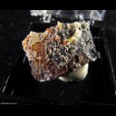Mineral Specimen: Wulfenite, Double Terminated Quartz, Calcite minor Mimetite on Pyrolusite from Dives Mine, Trigo Mts., La Paz Co., Arizona, Ex. S. Pullman, Collected by Pad Woolgemott
