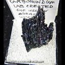 Mineral Specimen: Carborundum (Silicon Carbide - SiC) Crystals from Man made, used as abrasive, Ex. Norm Woods Mineral Specimen: Carborundum (Silicon Carbide - SiC) Crystals from Man made, used as abrasive, Ex. Norm Woods