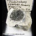 Mineral Specimen: Calcite crystals on Millerite on Chalcedony from Cessford Quarry, Dallas City, Hancock Co., Illinois, Collected by Norm Woods, 5/1/04