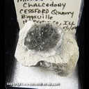 Mineral Specimen: Calcite crystals on Millerite on Chalcedony from Cessford Quarry, Dallas City, Hancock Co., Illinois, Collected by Norm Woods, 5/1/04 Mineral Specimen: Calcite crystals on Millerite on Chalcedony from Cessford Quarry, Dallas City, Hancock Co., Illinois, Collected by Norm Woods, 5/1/04
