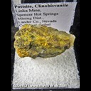 Mineral Specimen: Pottsite(TL), Clinobisvanite (SW Fluor.), Garnet from Linka Mine, Spencer Hot Springs Mining Dist., Lander Co., Nevada, coll. by John Seibel