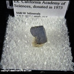 Mineral Specimen: Sapphire (Corundum) - sawed on left side from Kashmir sapphire mines, Padar, Kishtwar district, Jammu and Kashmir, India, Ex. Steve Pullman, Ex. California Academy of Sciences, donated in 1973
