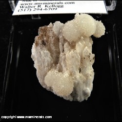 Mineral Specimen: Strontianite (SW - FL) on Barite from Medusa Aggregates North Quarry, Warren Co., Kentucky