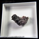 Mineral Specimen: Natrojarosite on Phosphosiderite from Lavra do Tome, Conselheiro Pena, Minas Gerais, Brazil, Ex. Luiz Menezes, (micro mount box - 25 x 25 mm)