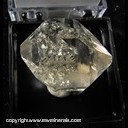 Mineral Specimen: Herkimer Diamond with gas/liquid bubbles, light smoky color from Ace of Diamonds, Herkimer Co., New York, Pre 1972