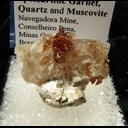 Mineral Specimen: Spessartine Garnet, Quartz, Muscovite from Navagadora Mine, Conselheiro Pena, Minas Gerais, Brazil Mineral Specimen: Spessartine Garnet, Quartz, Muscovite from Navagadora Mine, Conselheiro Pena, Minas Gerais, Brazil