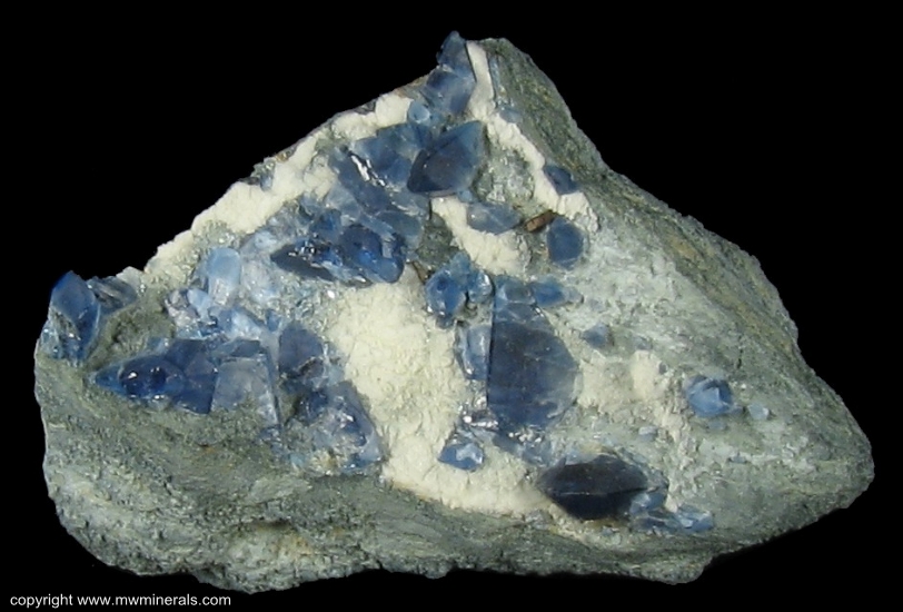 Mineral Specimen: Benitoite with minor Neptunite from Gem Mine, San Benito County, California, USA