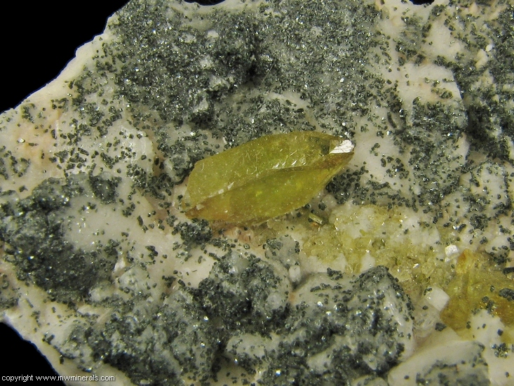 Mineral Specimen: Titanite Twin and Chlorite on Adularia from Warren Brothers Quarry, Acushnet, Bristol Co., Massachusetts, USA