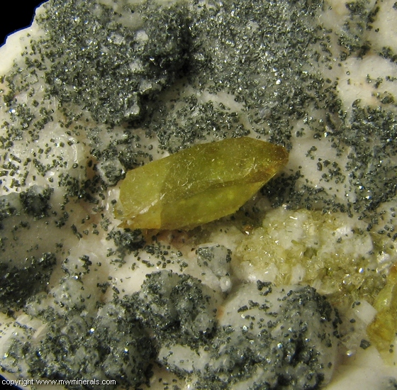 Mineral Specimen: Titanite Twin and Chlorite on Adularia from Warren Brothers Quarry, Acushnet, Bristol Co., Massachusetts, USA