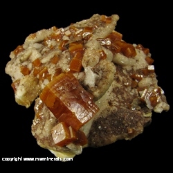 Minerals Specimen: Wulfenite, Descloizite on Calcite from Erupcion Mine, Ahumada, Sierra de Los Lamentos, Chihuahua, Mexico Minerals Specimen: Wulfenite, Descloizite on Calcite from Erupcion Mine, Ahumada, Sierra de Los Lamentos, Chihuahua, Mexico
