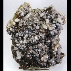 Minerals Specimen: Andradite Garnet and Quartz from El Mochito Mine, El Mocho, Santa Barbara Department, Honduras Minerals Specimen: Andradite Garnet and Quartz from El Mochito Mine, El Mocho, Santa Barbara Department, Honduras