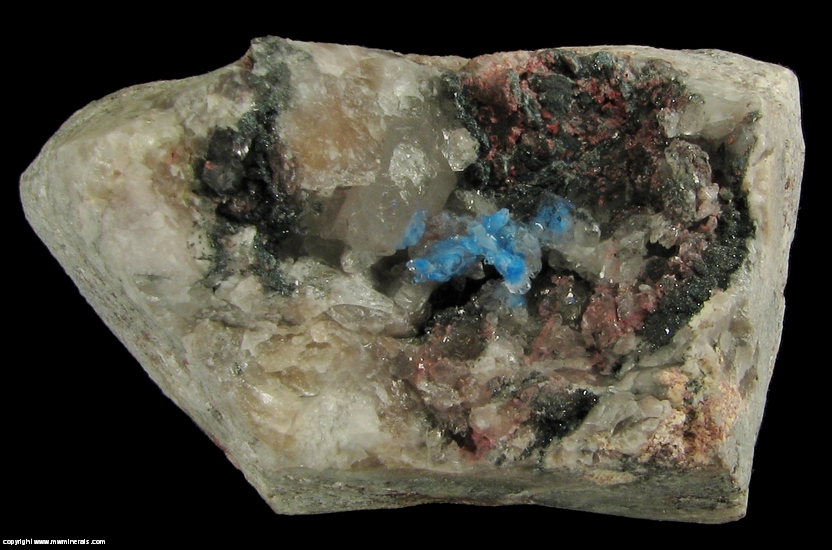 Mineral Specimen: Papagoite included in Quartz with Hematite from Messina mine, Messina District, Limpopo Province, South Africa