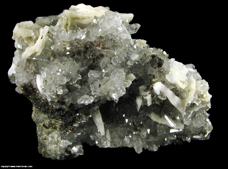 Mineral Specimen: Barite on Quartz over Andradite Garnet and Sphalerite from El Mochito Mine, El Mocho, Santa Barbara Department, Honduras