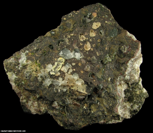 Mineral Specimen: Pumpellyite-Mg, Copper, Calcite with included Copper, Quartz and Microcline in Amygdule Basalt from Keweenaw Couny, Michigan, USA