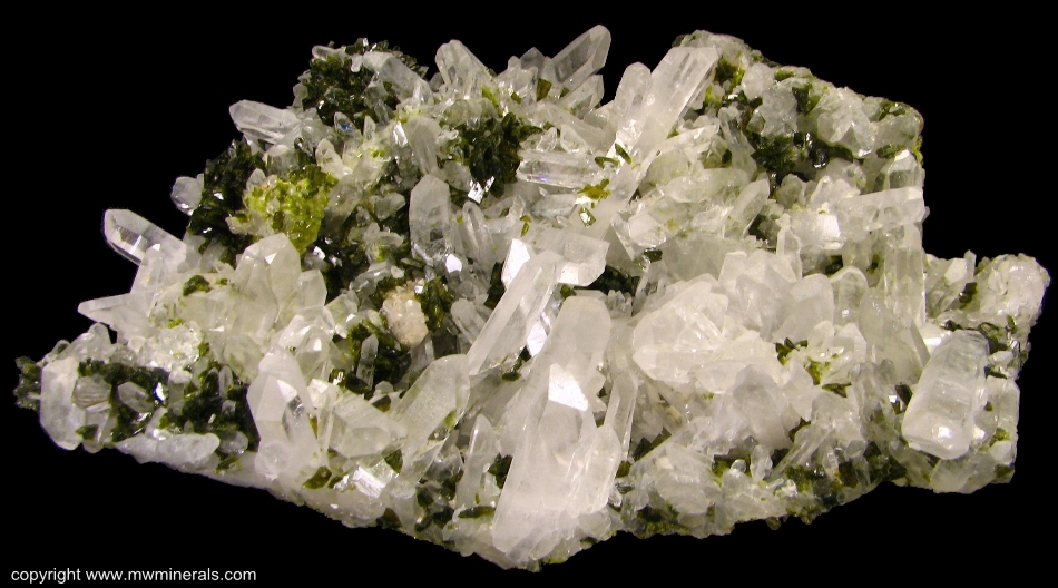 Mineral Specimen: Epidote on Quartz from Xichang Mine, Xichang County, Liangshan Autonomous Prefecture, Sichuan Province, China