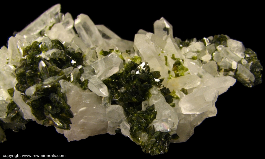 Mineral Specimen: Epidote on Quartz from Xichang Mine, Xichang County, Liangshan Autonomous Prefecture, Sichuan Province, China