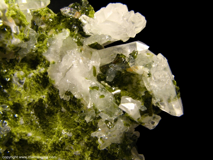 Mineral Specimen: Epidote on Quartz from Xichang Mine, Xichang County, Liangshan Autonomous Prefecture, Sichuan Province, China