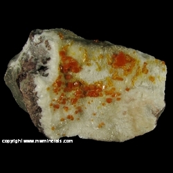 Mineral Specimen: Wulfenite on Calcite from Erupcion Mine, Ahumada, Sierra de Los Lamentos, Chihuahua, Mexico Mineral Specimen: Wulfenite on Calcite from Erupcion Mine, Ahumada, Sierra de Los Lamentos, Chihuahua, Mexico