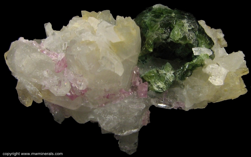 Mineral Specimen: Pink Topaz with Uvite Tourmaline, Magnesite and Quartz from Brumado. Bahia, Brazil