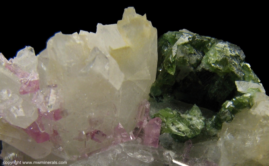 Mineral Specimen: Pink Topaz with Uvite Tourmaline, Magnesite and Quartz from Brumado. Bahia, Brazil