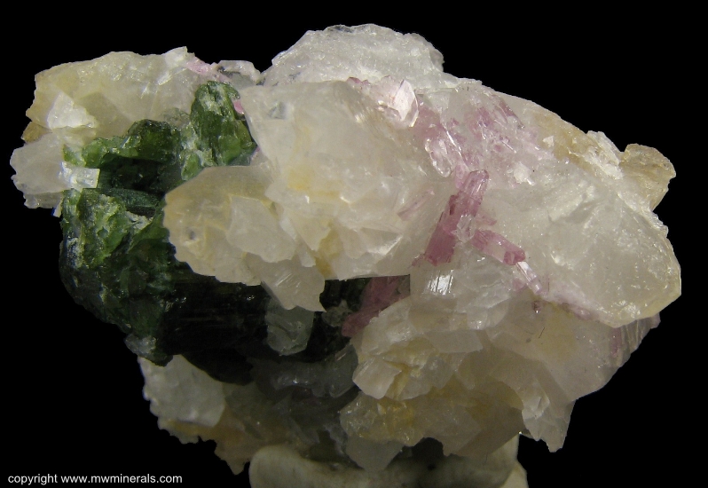 Mineral Specimen: Pink Topaz with Uvite Tourmaline, Magnesite and Quartz from Brumado. Bahia, Brazil