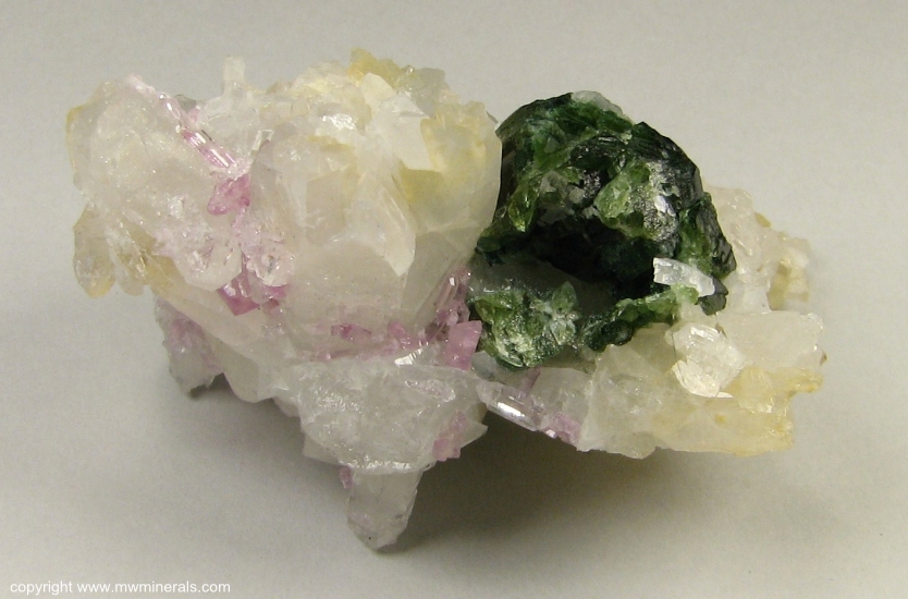 Mineral Specimen: Pink Topaz with Uvite Tourmaline, Magnesite and Quartz from Brumado. Bahia, Brazil