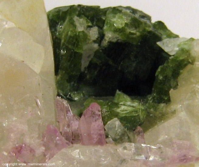 Mineral Specimen: Pink Topaz with Uvite Tourmaline, Magnesite and Quartz from Brumado. Bahia, Brazil