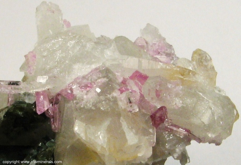 Mineral Specimen: Pink Topaz with Uvite Tourmaline, Magnesite and Quartz from Brumado. Bahia, Brazil