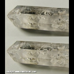 Minerals Specimen: Phantom Smoky Quartz with Enhydro Inclusions from Goboboseb Mountains, Brandberg Area, Erongo Region, Namibia Minerals Specimen: Phantom Smoky Quartz with Enhydro Inclusions from Goboboseb Mountains, Brandberg Area, Erongo Region, Namibia