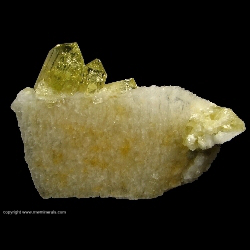 Minerals Specimen: Brazilianite on Albite from Jenipapo, Itinga, Minas Gerais, Brazil