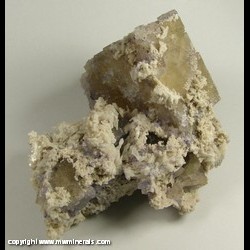 Minerals Specimen: Calcite on Etched Fluorite with Included Chalcopyrite from Hardin Co., Illinois Minerals Specimen: Calcite on Etched Fluorite with Included Chalcopyrite from Hardin Co., Illinois