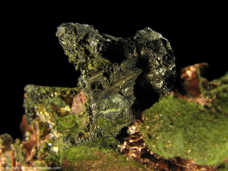 Mineral Specimen: Silver/Copper Halfbreed with Epidote from Calumet and Hecla Lode, Houghton County, Michigan, USA