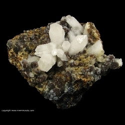 Mineral Specimen: Quartz on Andradite Garnet from El Mochito Mine, El Mocho, Santa Barbara Department, Honduras Mineral Specimen: Quartz on Andradite Garnet from El Mochito Mine, El Mocho, Santa Barbara Department, Honduras