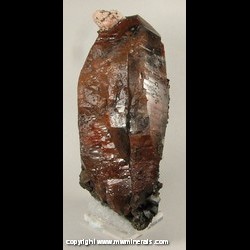 Mineral Specimen: Smoky Quartz with Included Hematite, Goethite Pseudomorphs after Siderite, Microcline from Teller Co., Colorado Mineral Specimen: Smoky Quartz with Included Hematite, Goethite Pseudomorphs after Siderite, Microcline from Teller Co., Colorado