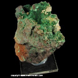 Mineral Specimen: Malachite Crystals on Massive Cuprite with Quartz from Mapimi, Durango, Mexico