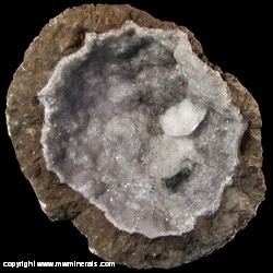 Mineral Specimen: Lilac Amethyst Coconut Geode with Twinned Calcite Crystal from Chihuahua, Mexico Mineral Specimen: Lilac Amethyst Coconut Geode with Twinned Calcite Crystal from Chihuahua, Mexico